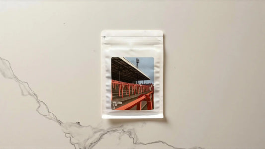 Wrexham Bean African Moon coffee with a print of Wrexham AFC's Racecourse Ground
