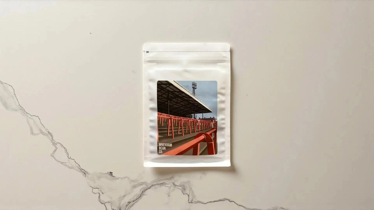 Wrexham Bean African Moon coffee with a print of Wrexham AFC's Racecourse Ground