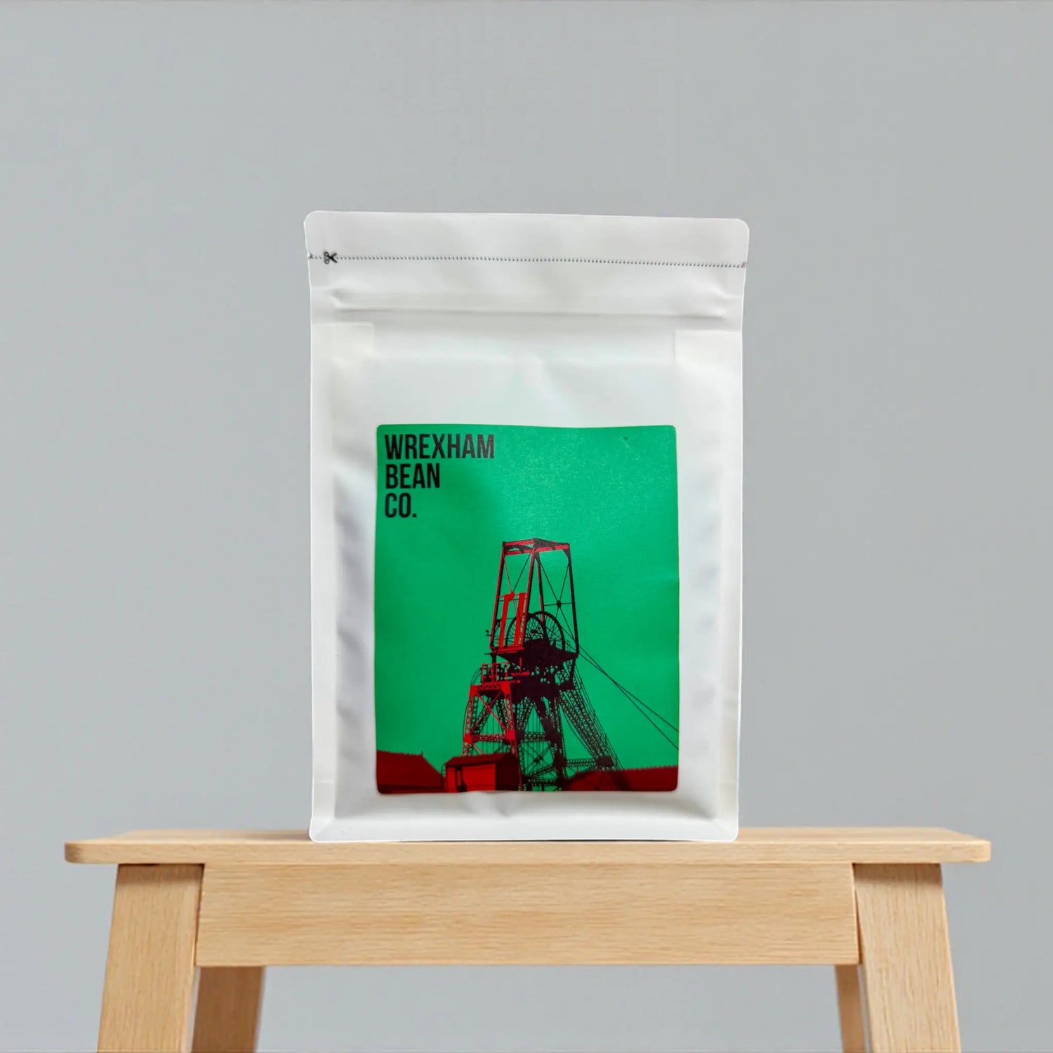 Speciality Coffee tasting box, coffee bag on chair, Brazilian and Ugandan speciality coffee blend