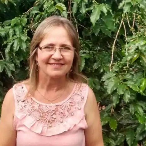 Coffee producer standing in Brazilian coffee plantation